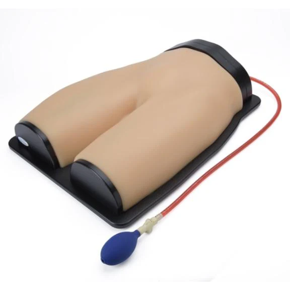 medical training manikin of a buttocks and upper leg section, with an attached inflation bulb, used for practicing intramuscular injections